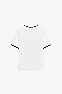 VESTE EN MAILLE LISERÉS CONTRASTE