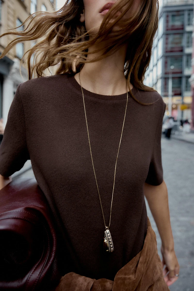 CUT-OUT KNIT TOP