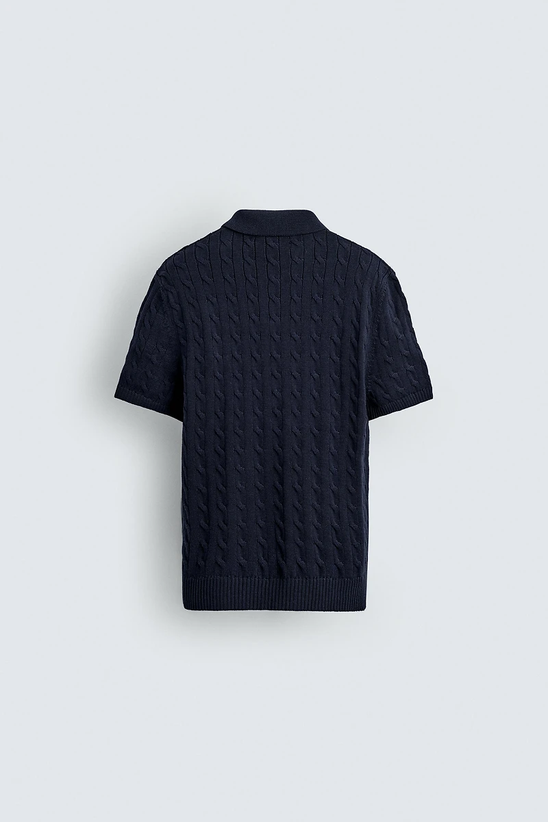 POLO EN MAILLE STRUCTURÉE À TRESSES