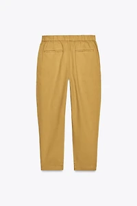 JOGGER PANTS WITH BUTTONED HEM