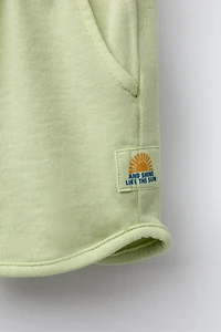 STRAIGHT GARMENT DYE LABEL PLUSH SHORTS