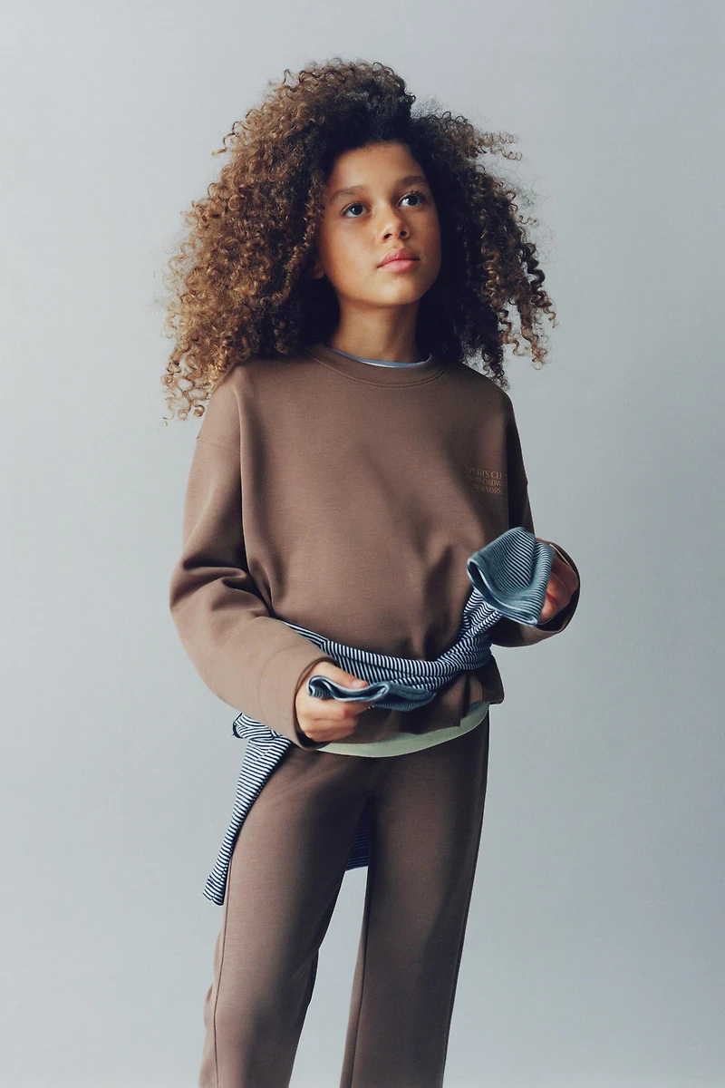 PANTALON FLARE AVEC MODAL