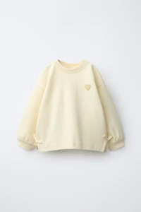 INTERLOCK BOW AND HEART SWEATSHIRT