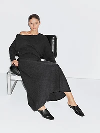Wool blend knit sweater with asymmetric neckline