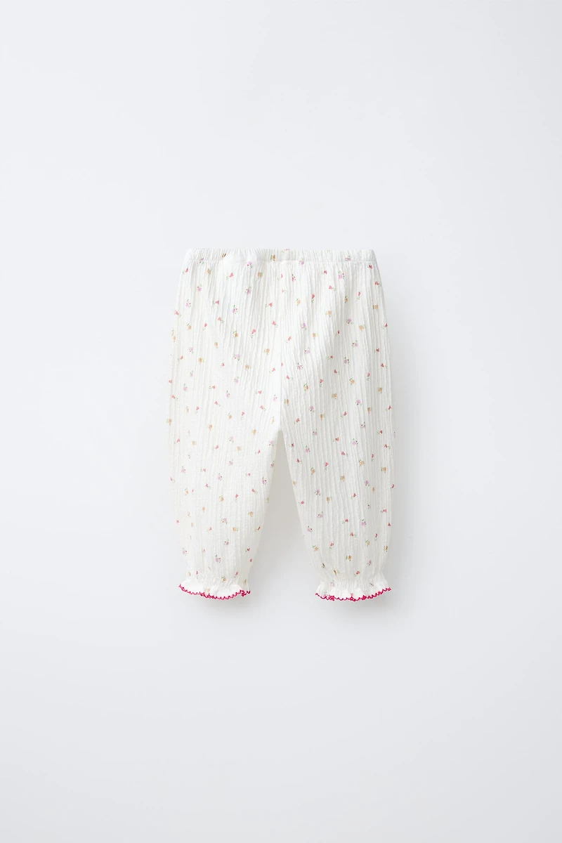TEXTURED FLORAL PANTS