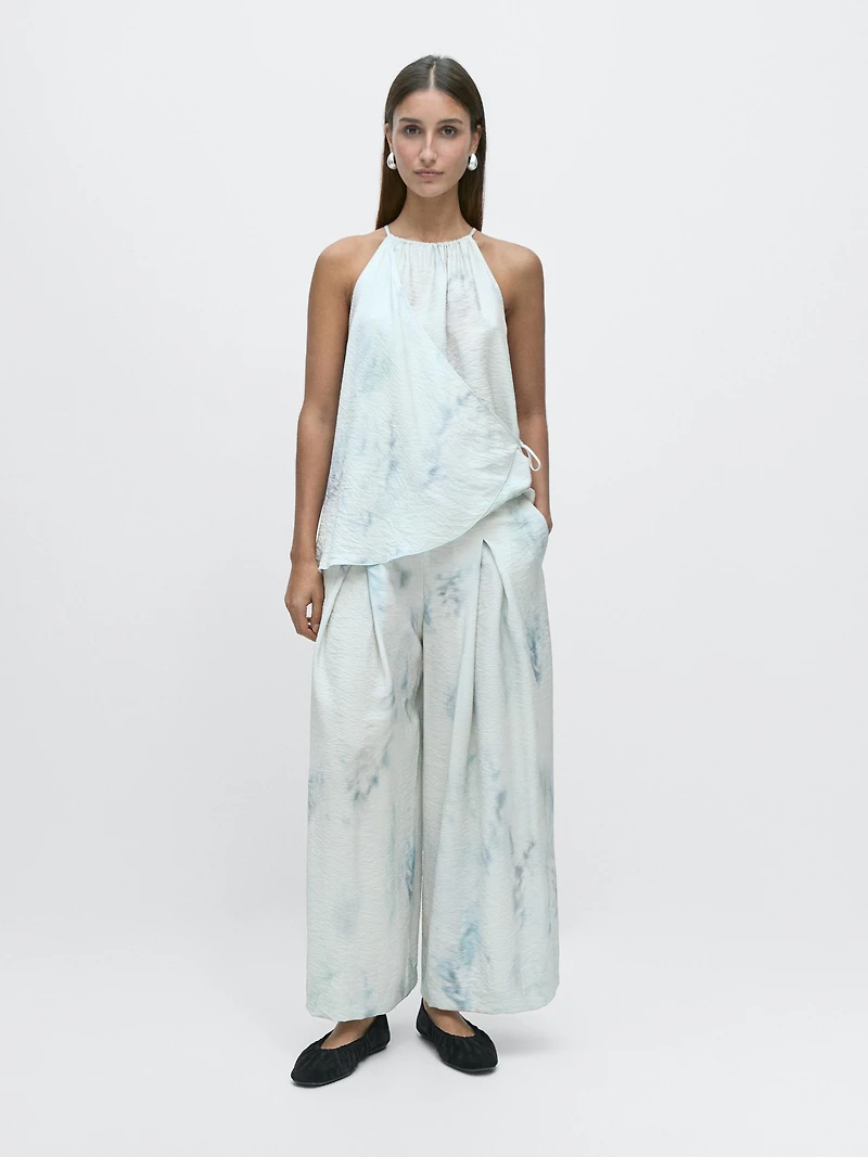 Printed trousers with pleat details