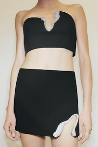 MINI-JUPE PIÈCE BIJOUX