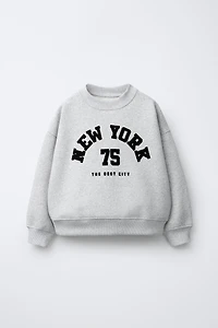 SWEAT À IMPRIMÉ INSCRIPTION FLOQUÉE