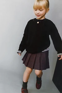 PLAID BUCKLE SKORT