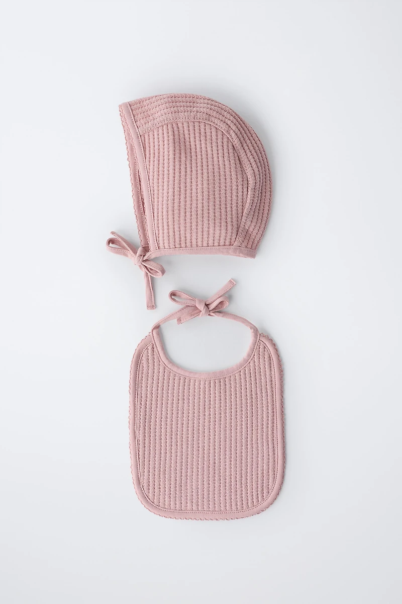 BONNET AND BIB SET STRUCTURE