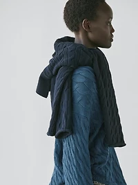 Cotton blend knit sweater with knot details