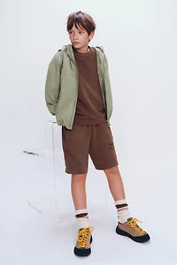 HOODED WATER REPELLENT RAINCOAT