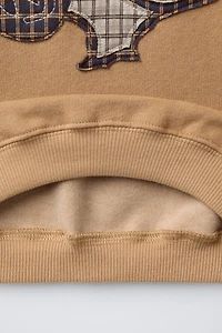 SNOOPY PEANUTS™ PATCH SWEATSHIRT