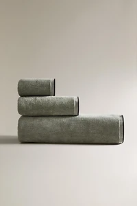VELOUR OVERLOCK BATH TOWEL