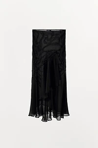 JUPE MI-LONGUE À VOLANTS ET FANTAISIE