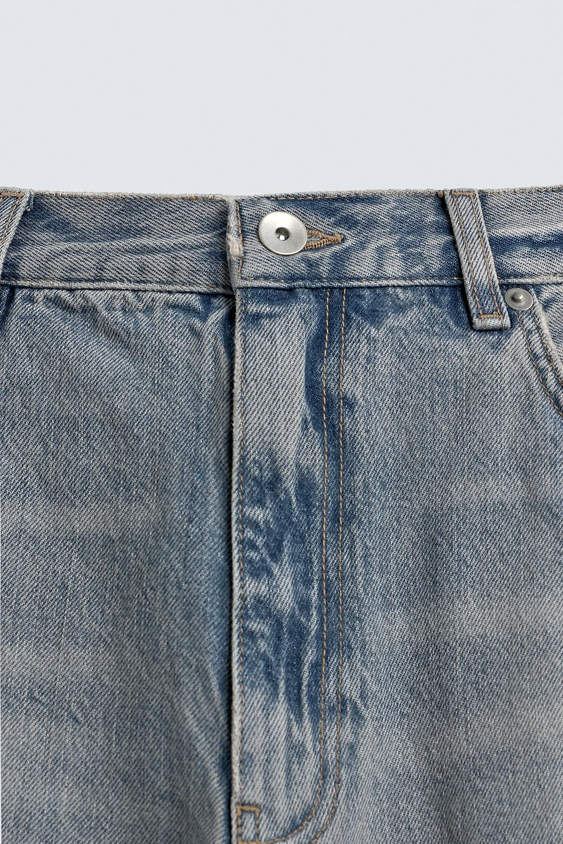 LOOSE FIT RIPPED JEANS