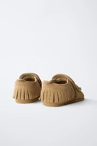 CHAUSSURES EN CUIR