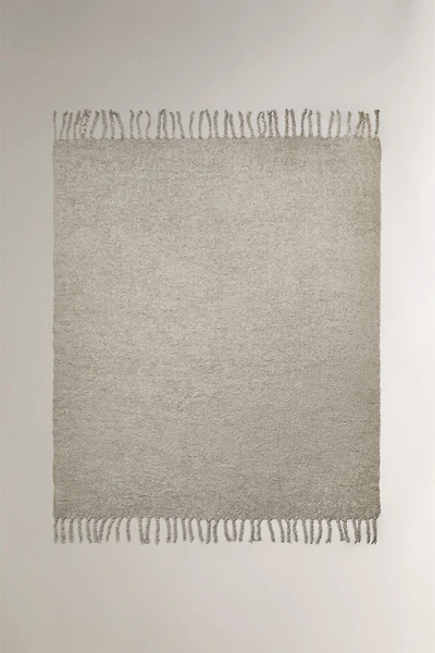 COUVERTURE À FRANGES