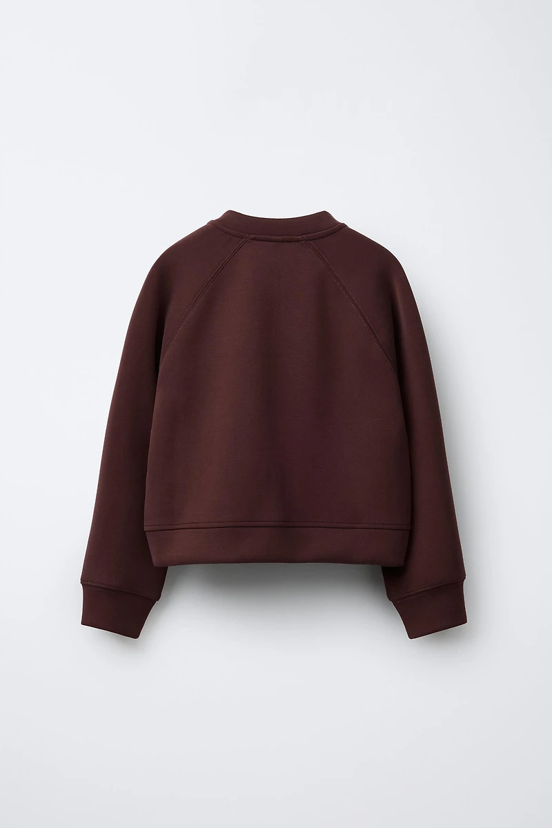 SPORTY JACKET WITH RAISED TEXT