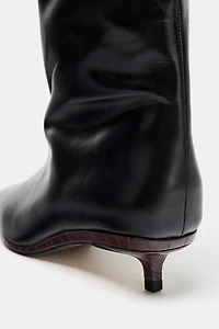 BOTTES HAUTES EN CUIR LIMITED EDITION