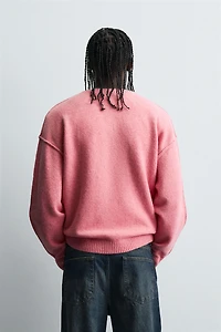 TEXTURED SWEATER WITH REVERSE EFFECT SEAMS