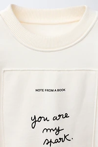 PATCH AND FLOCKED TEXT SWEATSHIRT