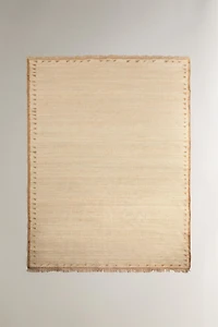 JUTE AND COTTON AREA RUG WITH FRINGING