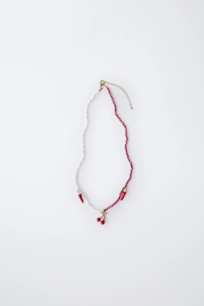 PEPPER AND CHERRY BEADED PENDANT