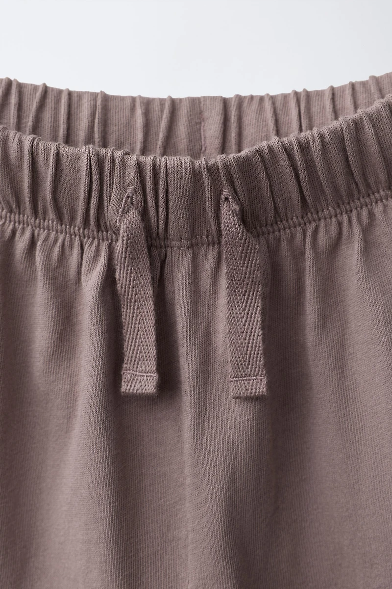 SHORT OVERSIZE SURPIQÛRES