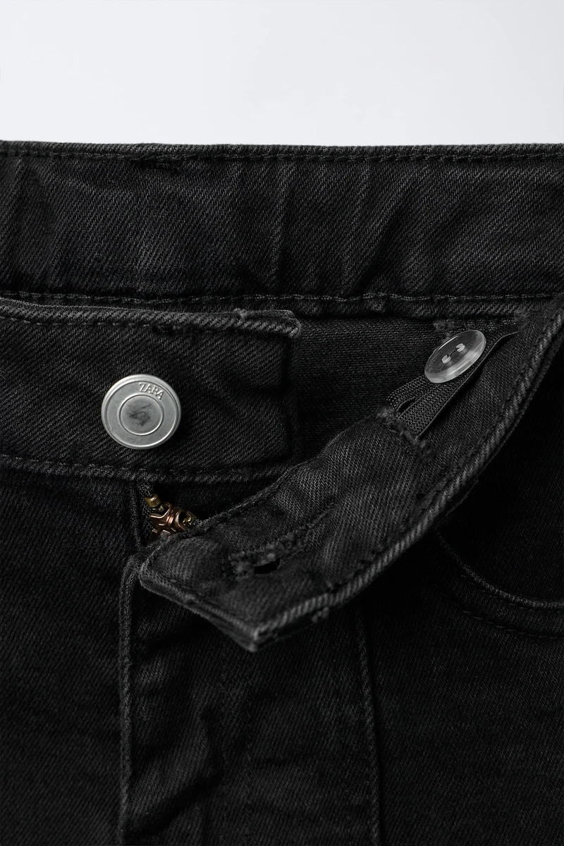 BOOTCUT JEANS WITH STAR PATCHES