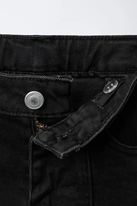 BOOTCUT JEANS WITH STAR PATCHES