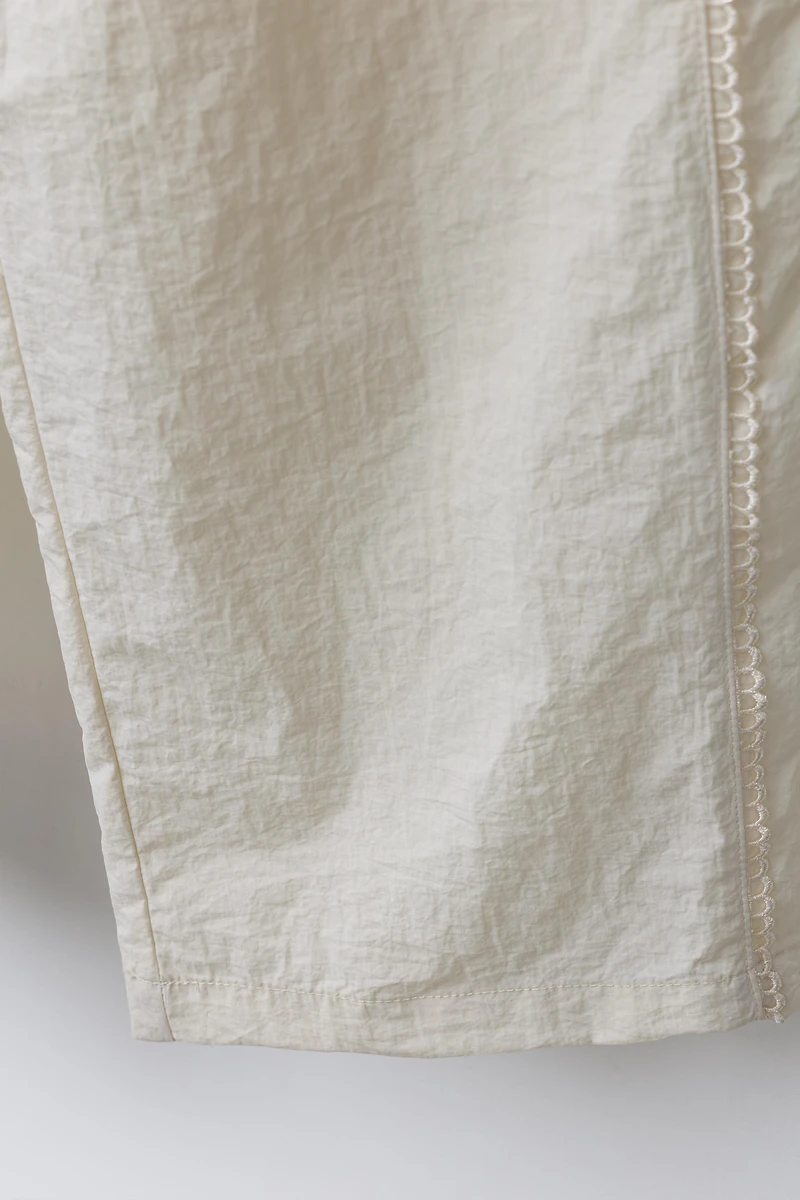 CONTRAST NYLON STRAIGHT LEG PANTS