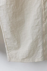 CONTRAST NYLON STRAIGHT LEG PANTS