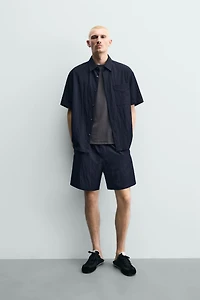 RELAXED FIT FLOWY SHORTS