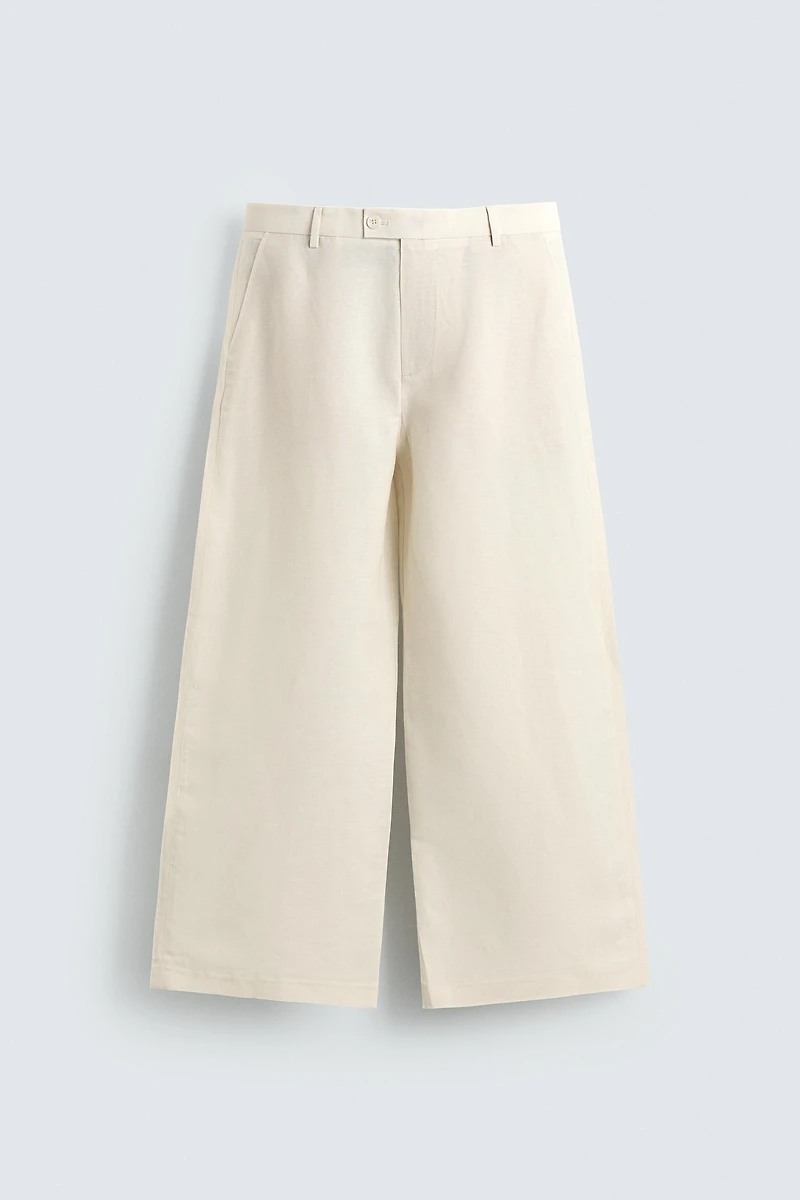 RELAXED FIT PLEATED PANTS