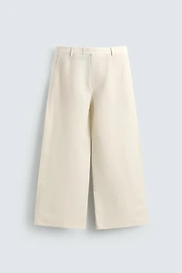 RELAXED FIT PLEATED PANTS