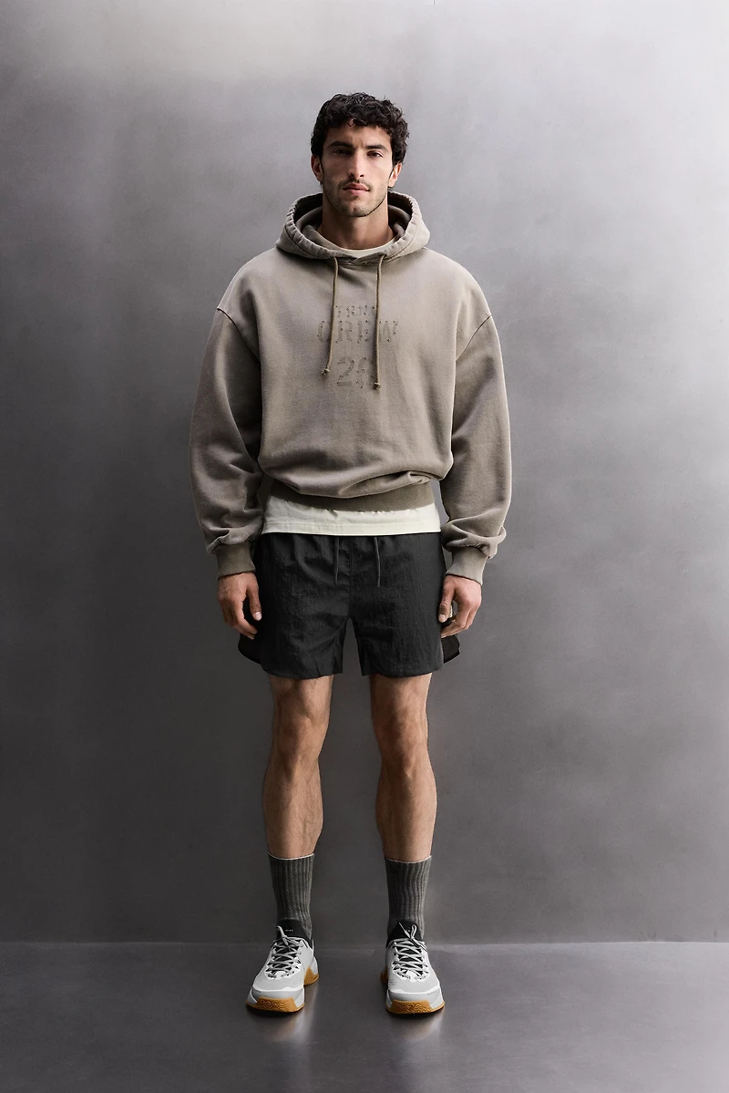 WASHED RELAXED FIT TRAINING SWEATSHIRT