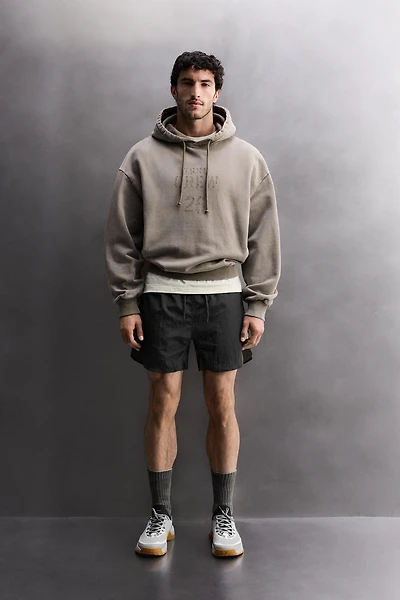 WASHED RELAXED FIT TRAINING SWEATSHIRT