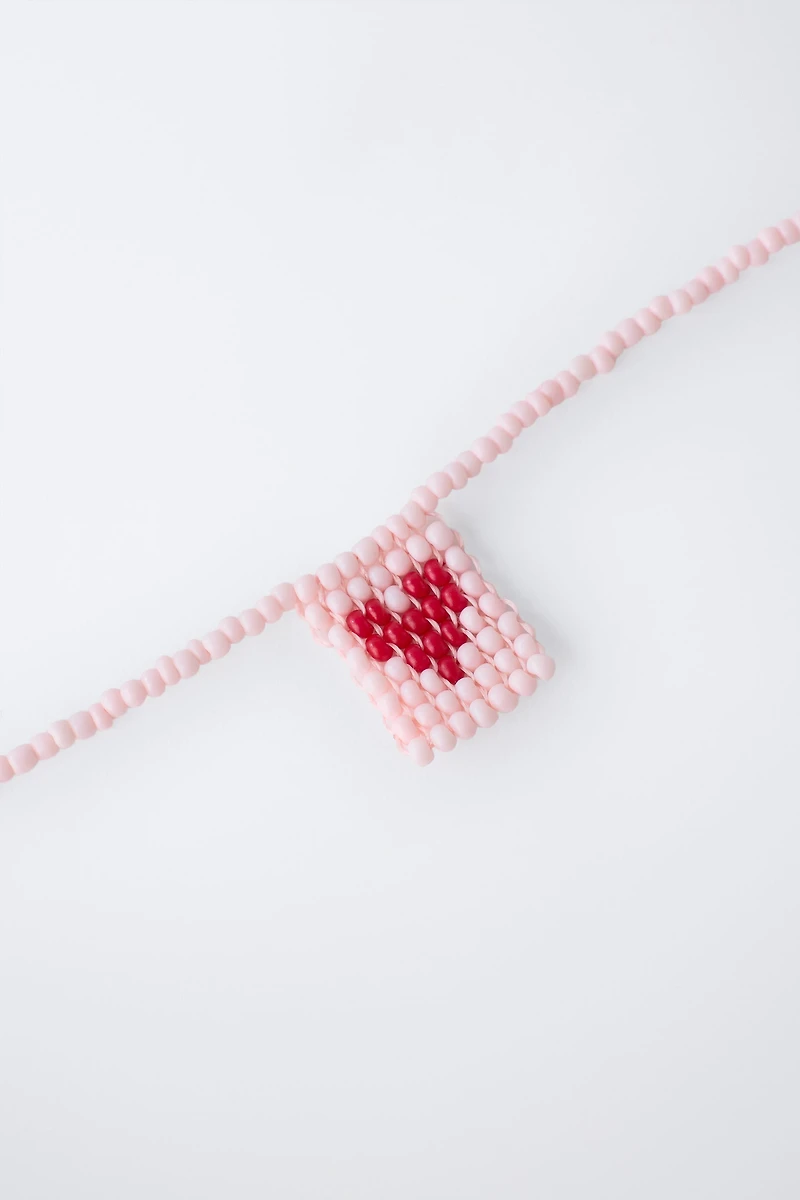 PACK OF TWO BEADED HEART NECKLACES