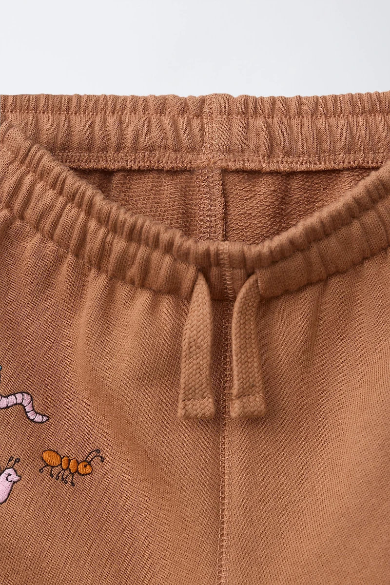 EMBROIDERED ANIMAL PLUSH PANTS
