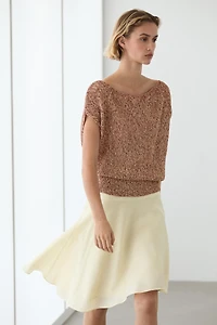 Cotton blend knit top with ribbed hem