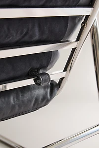 LEATHER AND STAINLESS STEEL ACCENT CHAIR