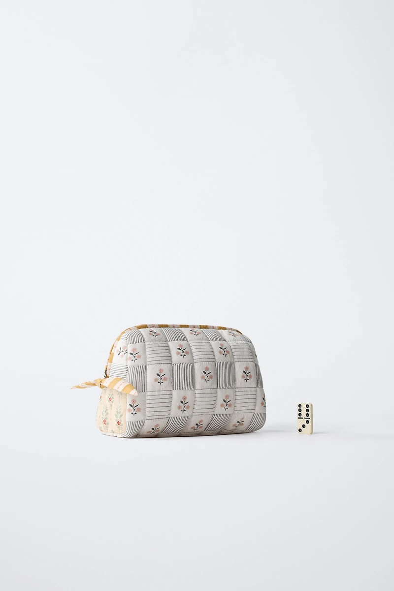 QUILTED MATERNITY TOILETRY BAG