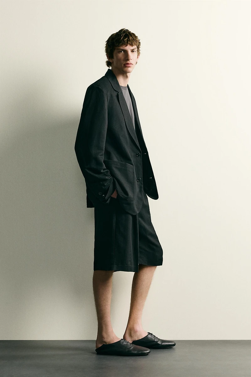 TEXTURED PLEATED SUIT SHORTS