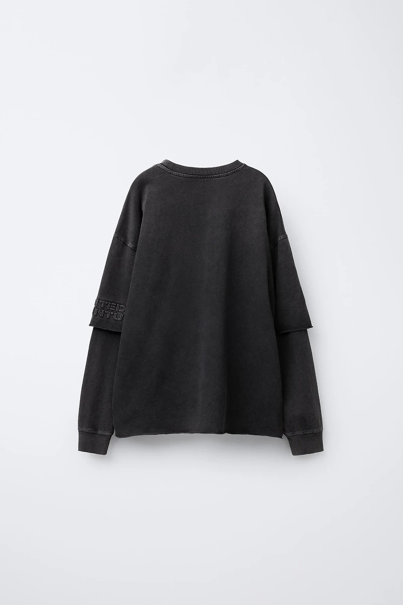 WASHED EFFECT DOUBLE SLEEVE RAISED TEXT T-SHIRT