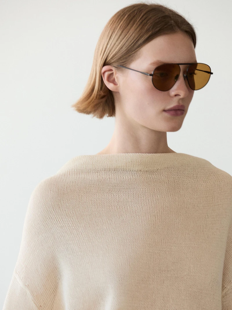 100% cotton knit sweater with back ties
