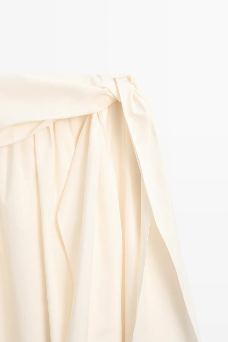 Flowing skirt with scarf detail