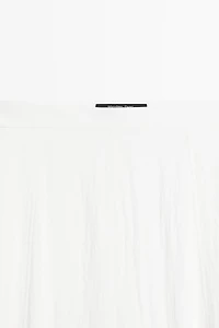 Flowing sarouel trousers with textured detail