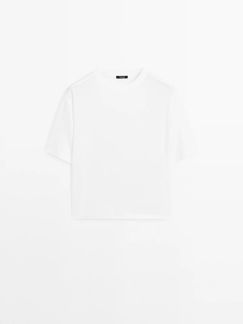 T-shirt oversize couture apparente