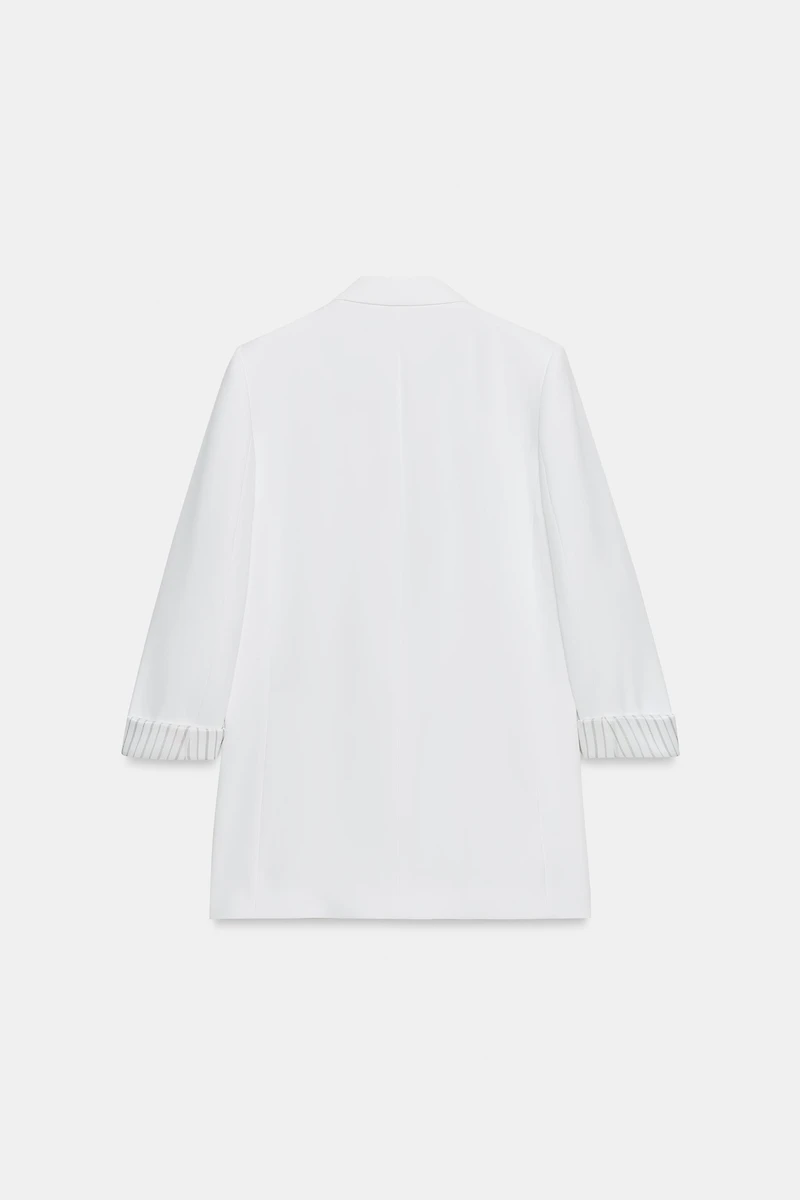 VESTE À MANCHES RETROUSSÉES ET POIGNETS IMPRIMÉS